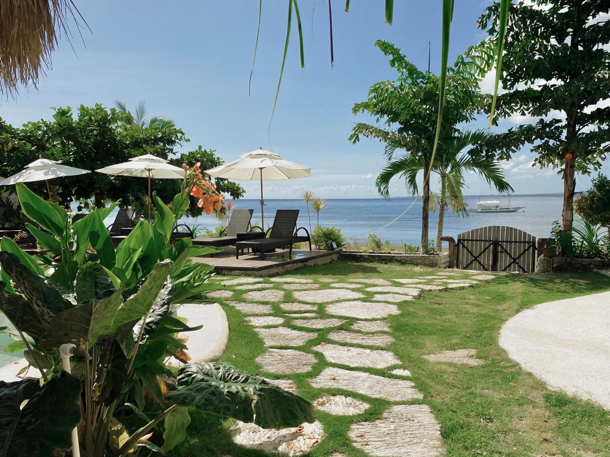 Avila'S Horizon Dive Resort Santander Exterior foto